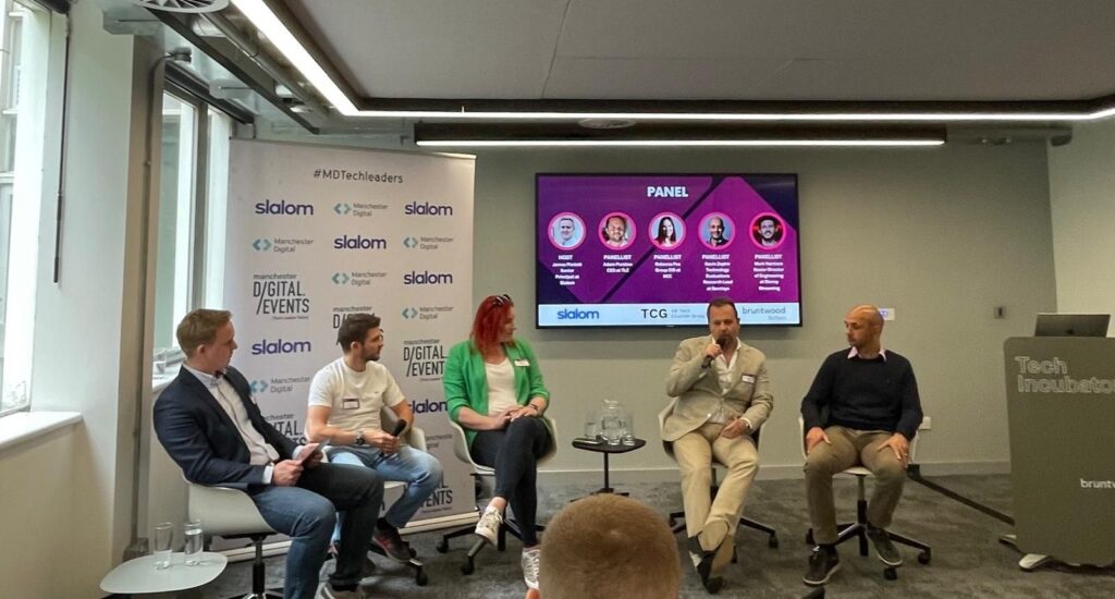 Adam Purslow speaking on a hospitality technology panel